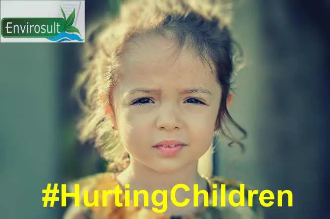 Young girl with a concerned expression and #HurtingChildren text overlay.